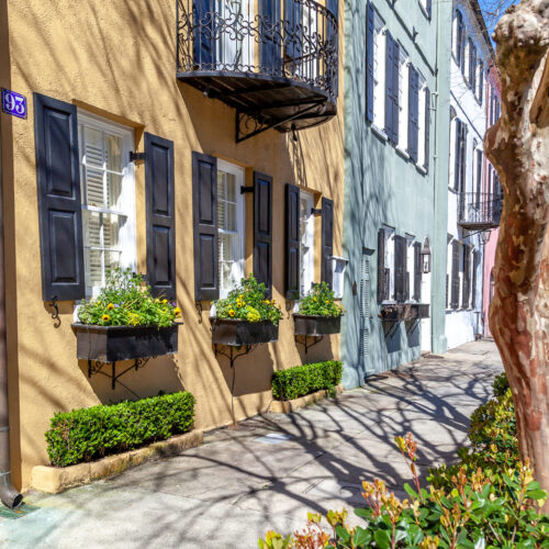 Charleston, South Carolina, USA - February 28, 2020: Rainbow Row in the morning, the name for a series of thirteen colorful historic houses in Charleston, South Carolina.